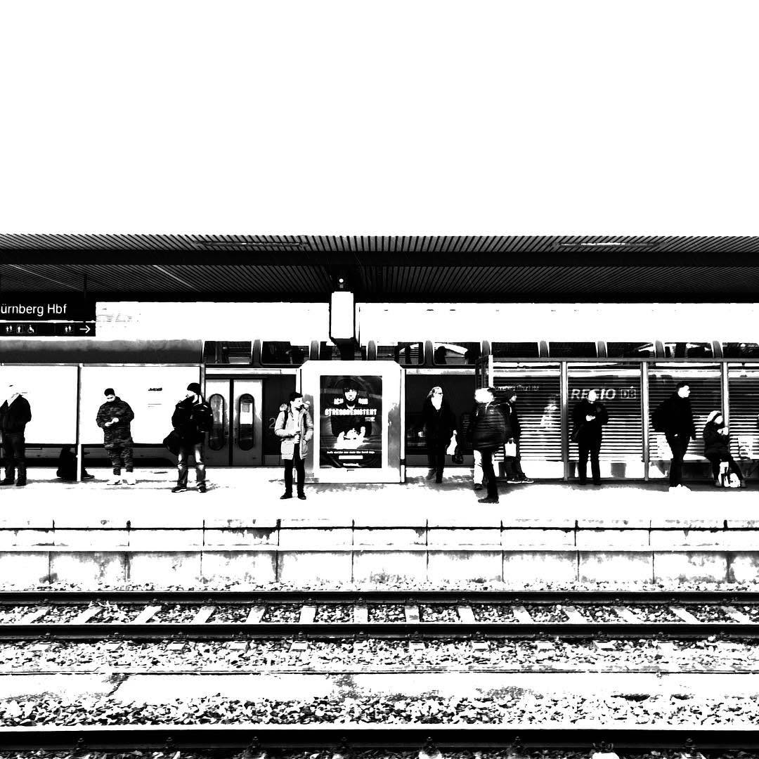 Black and white train platform.