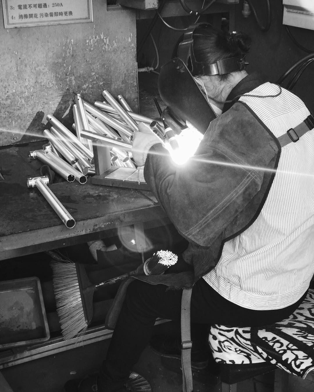 Black and white welding scene.